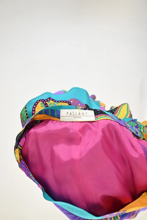 Purple silk bateau neck cap sleeve two-piece ra-ra skirt set with velcro floral belt