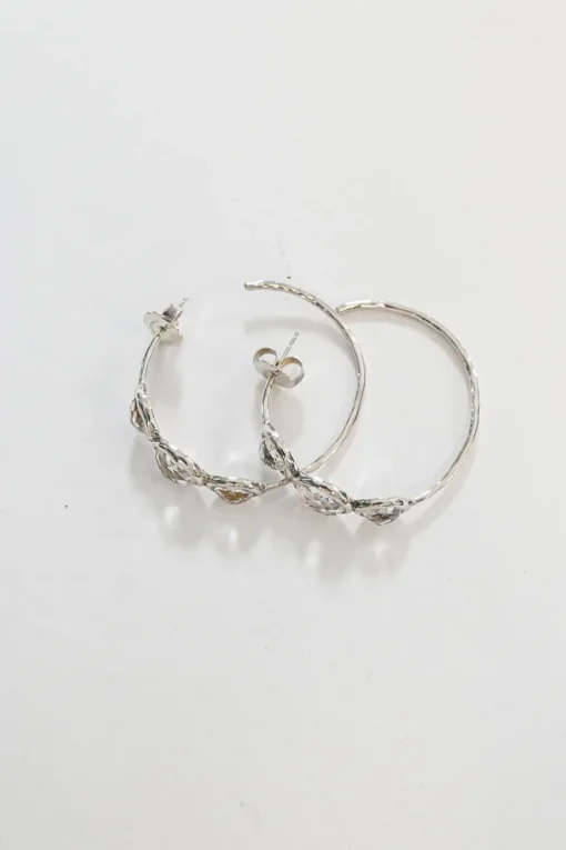 1.5" Silver three-stone rock candy clear quartz hoop earrings