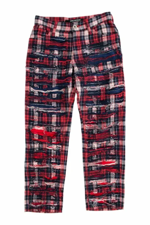 Red, black and white plaid check skinny pants with distressed details