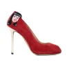 Red high heel pumps with pop art embroidery