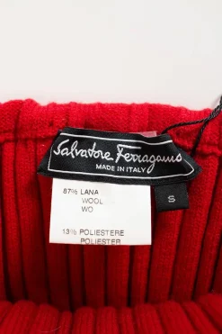 Red knitted knee-length skirt