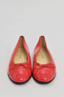 Red patent leather signature bow ballerinas featuring tonal Coco Mark topstitched cap toe