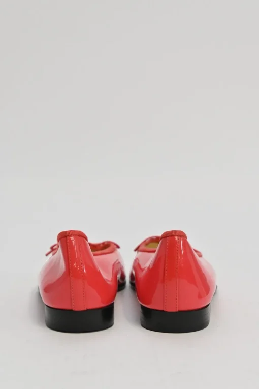 Red patent leather signature bow ballerinas featuring tonal Coco Mark topstitched cap toe