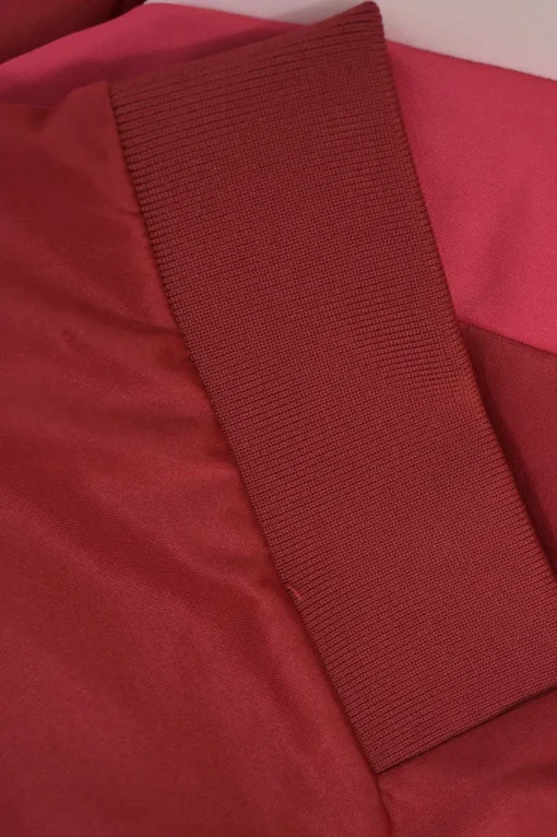 Red polyester-blend two-piece tracksuit with funnel collar zip-up jacket and high-rise wide-leg pants