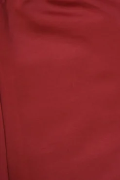Red polyester-blend two-piece tracksuit with funnel collar zip-up jacket and high-rise wide-leg pants