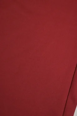Red polyester-blend two-piece tracksuit with funnel collar zip-up jacket and high-rise wide-leg pants