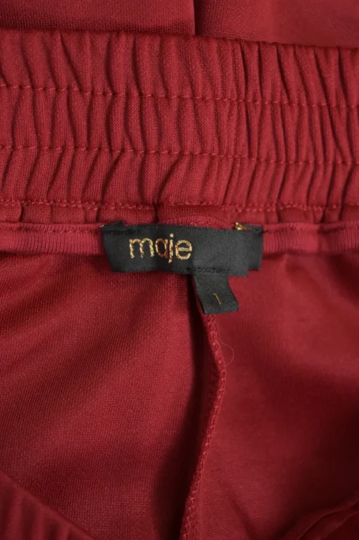 Red polyester-blend two-piece tracksuit with funnel collar zip-up jacket and high-rise wide-leg pants
