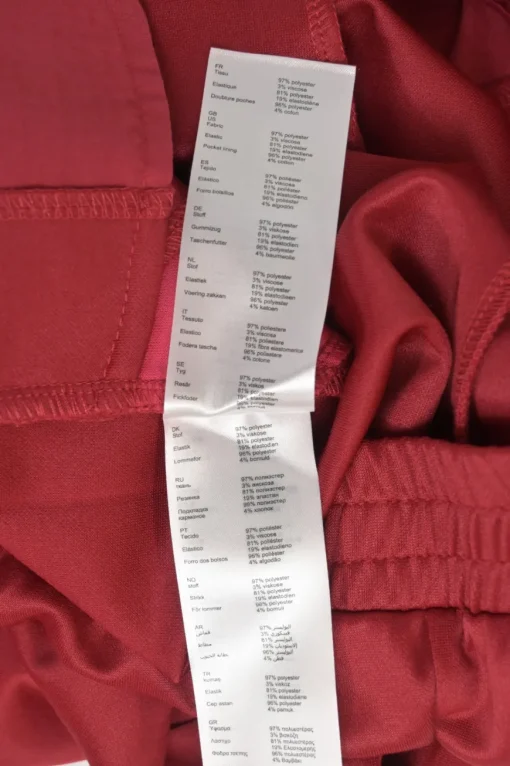 Red polyester-blend two-piece tracksuit with funnel collar zip-up jacket and high-rise wide-leg pants
