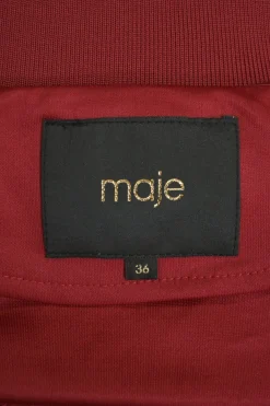 Red polyester-blend two-piece tracksuit with funnel collar zip-up jacket and high-rise wide-leg pants