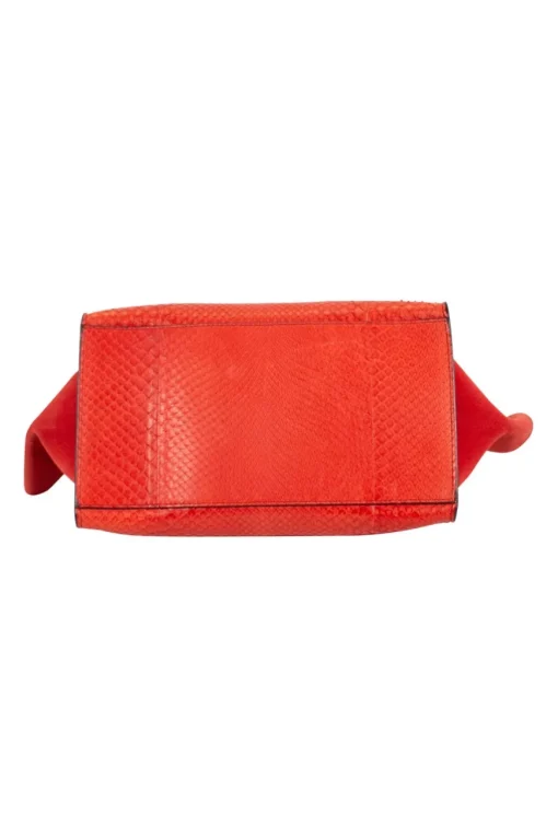 Red trapeze leather and suede Top handle bag with detachable strap