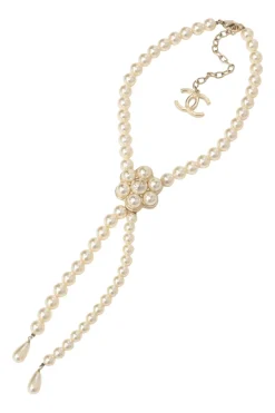 Resin faux pearl and gold-finish metal floral lariat necklace with lobster clasp closure