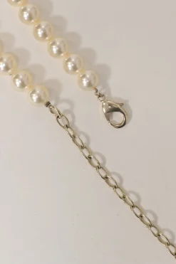 Resin faux pearl and gold-finish metal floral lariat necklace with lobster clasp closure