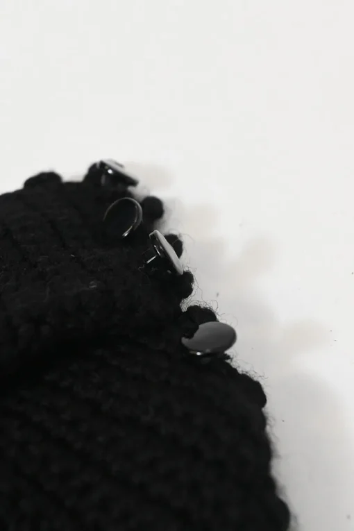 Rive Gauche black wool crochet floral boutonnière