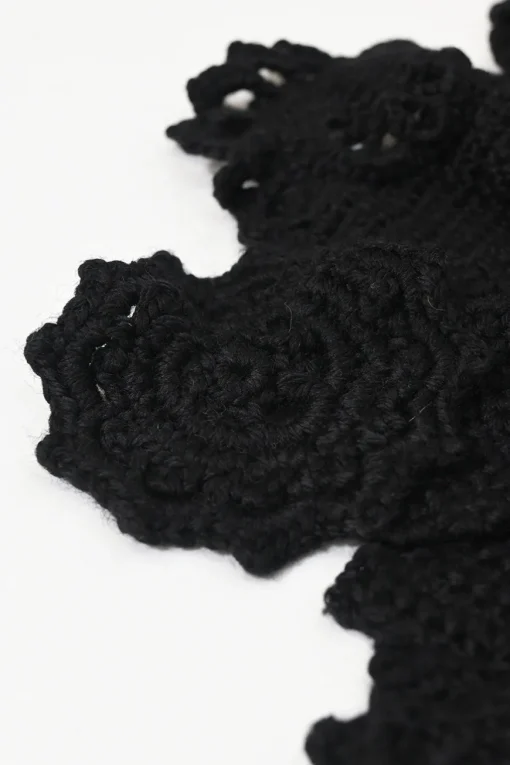 Rive Gauche black wool crochet floral boutonnière