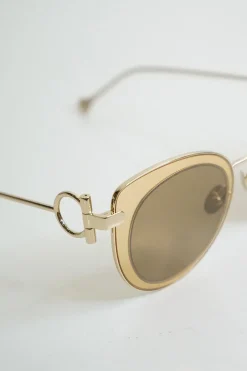 Salvatore Ferragamo gold cat eye sunglasses with circled metal temples