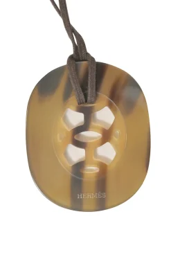 Silver and brown lacquered horn Lift pendant on waxed cotton strap