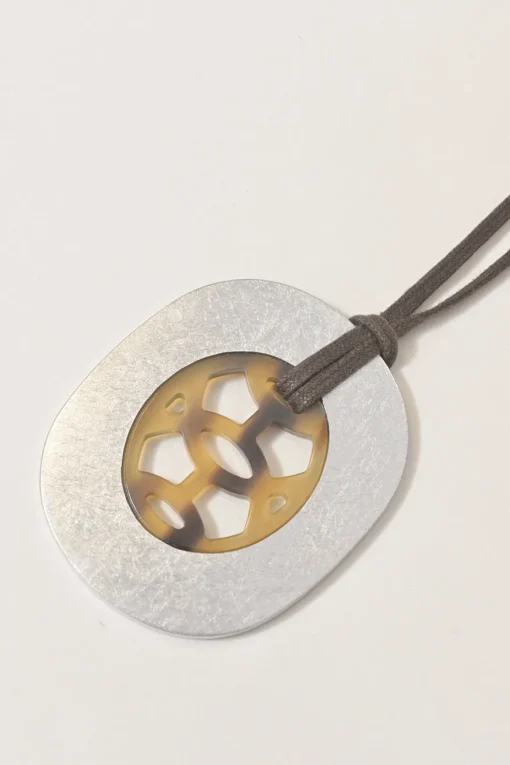 Silver and brown lacquered horn Lift pendant on waxed cotton strap