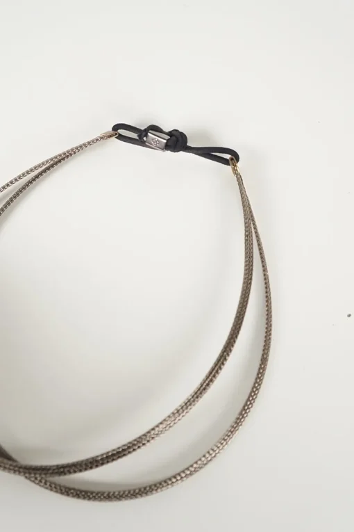 silver colour headband in braided hand shaped wire filament