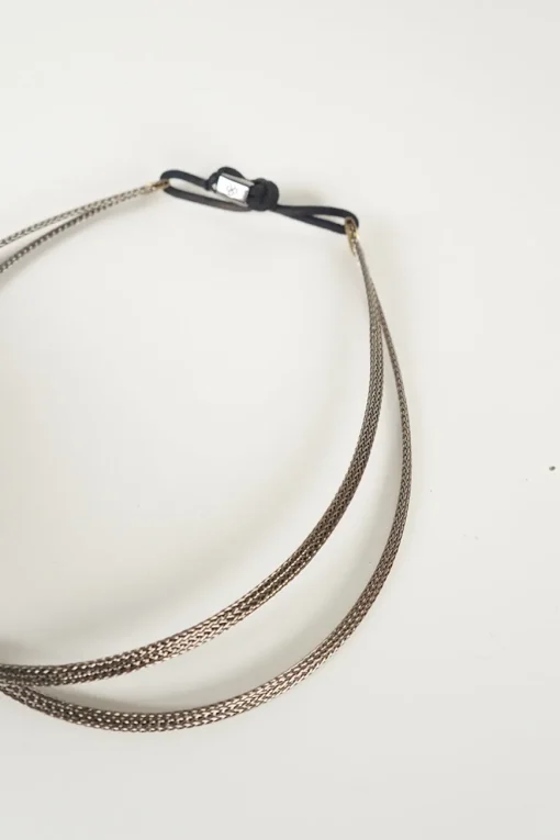 silver colour headband in braided hand shaped wire filament