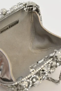 Silver crystal-embellished chain skull clutch with kiss lock fastening
