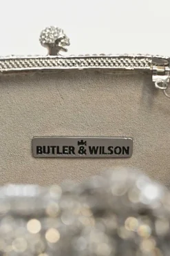 Silver crystal-embellished chain skull clutch with kiss lock fastening