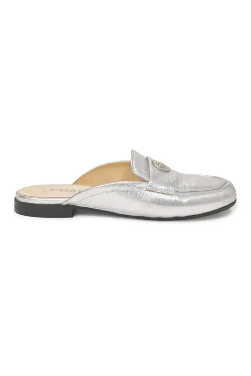 Silver foiled leather round-toe slip-on mules with camellia medallion appliqué