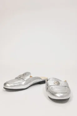 Silver foiled leather round-toe slip-on mules with camellia medallion appliqué