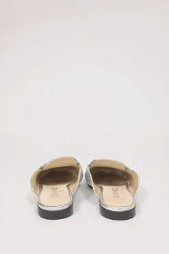 Silver foiled leather round-toe slip-on mules with camellia medallion appliqué