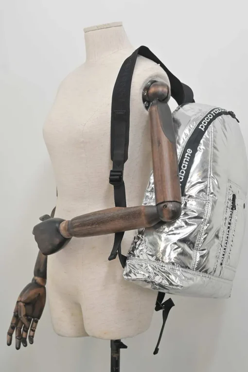 Silver foiled ripstop rucksack featuring branded sealed zipper tape and adjustable jacquard shoulder straps