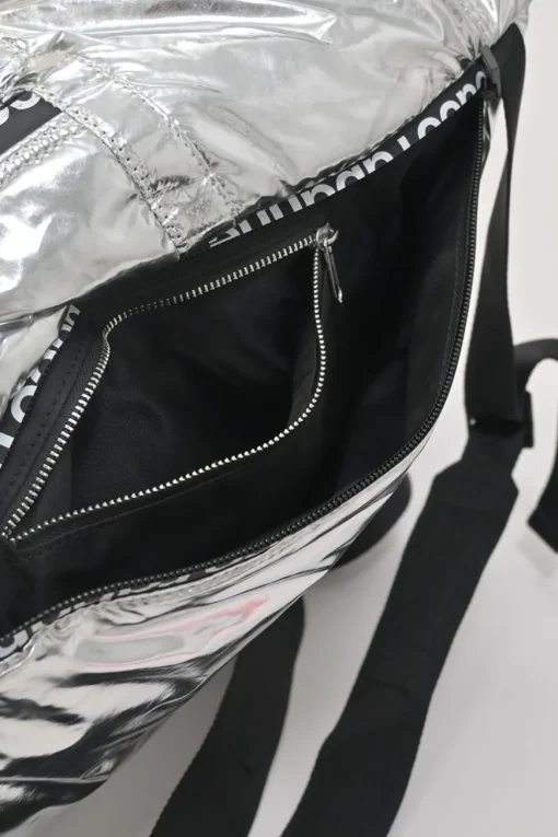 Silver foiled ripstop rucksack featuring branded sealed zipper tape and adjustable jacquard shoulder straps