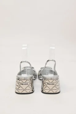 Silver mirrored leather slingback pumps with faceted logo vamp plaque and mirrored block heels