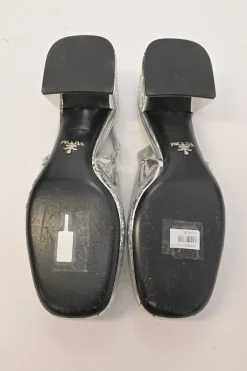 Silver mirrored leather slingback pumps with faceted logo vamp plaque and mirrored block heels