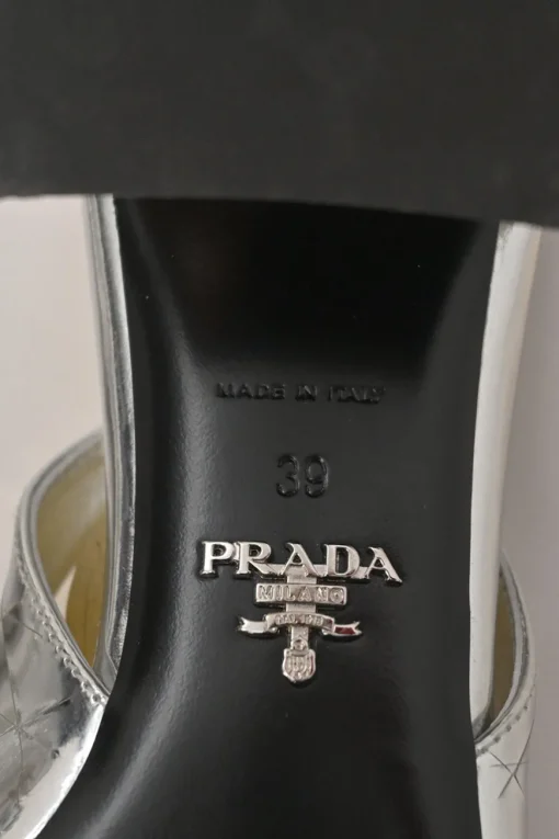Silver mirrored leather slingback pumps with faceted logo vamp plaque and mirrored block heels