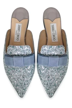 Silver with turquoise painted coarse glitter 'Galaxy' point-toe mules decorated with bow