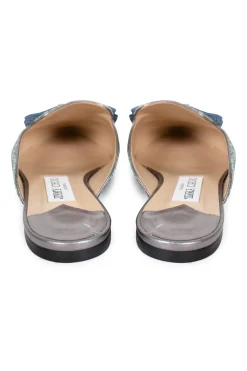 Silver with turquoise painted coarse glitter 'Galaxy' point-toe mules decorated with bow