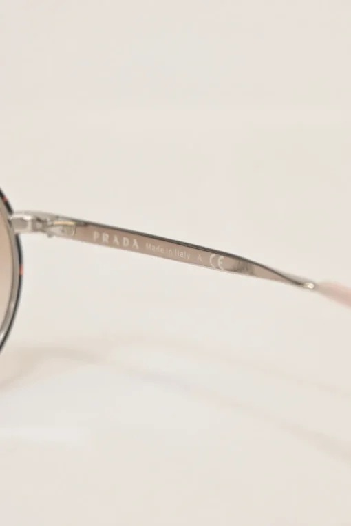 Silver-finish metal and blush tinted polycarbonate double-bridge round-eye sunglasses
