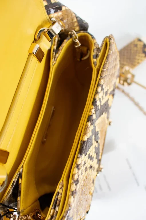 2016 Spring Runway yellow and black python square padlock bag.