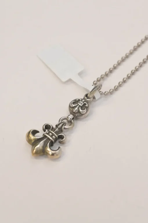 Sterling silver fleur de lis solitaire pendant on ball bead chain