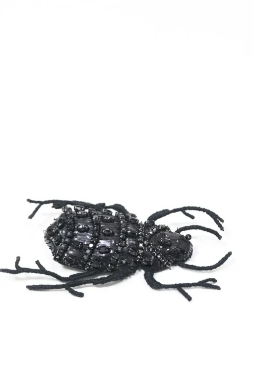 Strass-embellished black yarn-wrapped wire beetle brooch