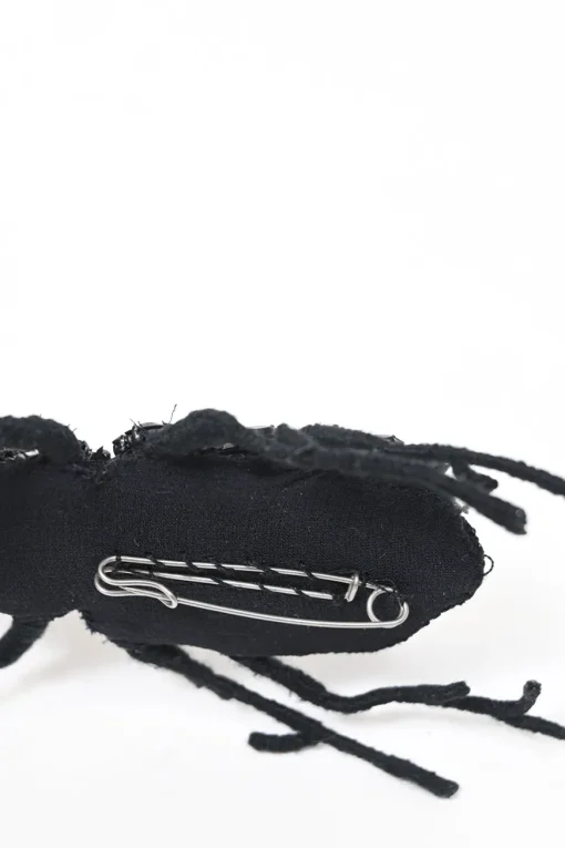 Strass-embellished black yarn-wrapped wire beetle brooch