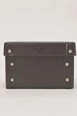 Studded laser-cut leather harness waist belt with scalloped edges