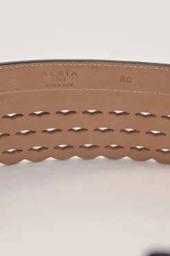 Studded laser-cut leather harness waist belt with scalloped edges