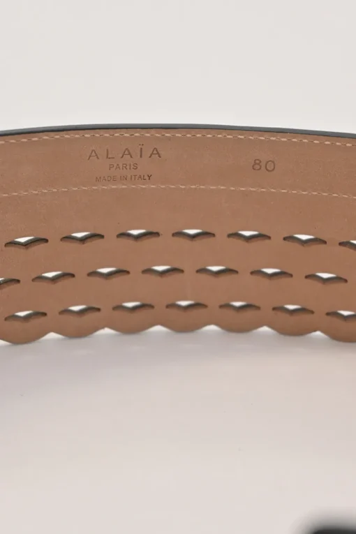 Studded laser-cut leather harness waist belt with scalloped edges