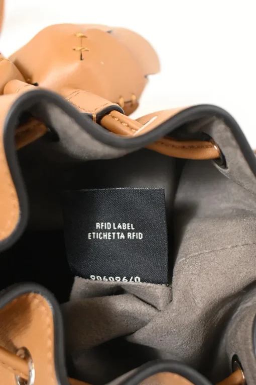 Tan calfskin leather F is Fendi 3D Flower Mini Mon Trésor bucket bag