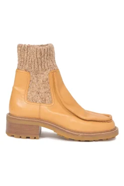 Tan leather and rubber Jamie moc-toe Chelsea boots with marled knit cuffs and track soles