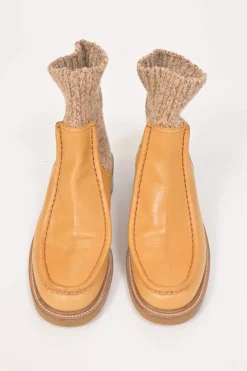 Tan leather and rubber Jamie moc-toe Chelsea boots with marled knit cuffs and track soles