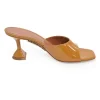 Tan patent leather and leather Lupita slide sandals with sculpted comma heels