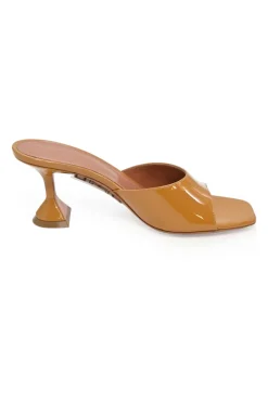 Tan patent leather and leather Lupita slide sandals with sculpted comma heels