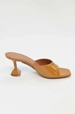 Tan patent leather and leather Lupita slide sandals with sculpted comma heels