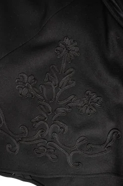 Tara Jarmon black wool flared skirt with flower embroidery. SIde button up
